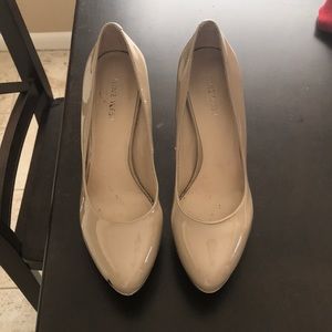 Nine West nude platform pumps